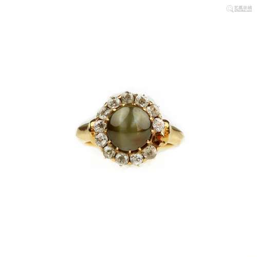 A cat's eye chrysoberyl and diamond cluster ring