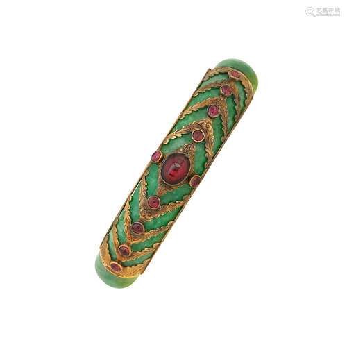 A green hardstone bangle