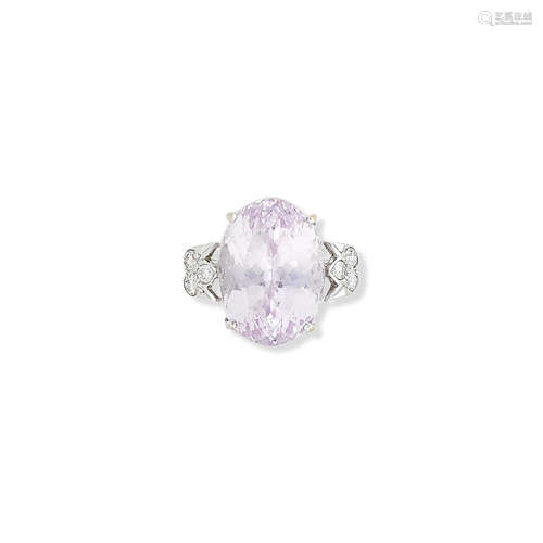 A kunzite and diamond ring