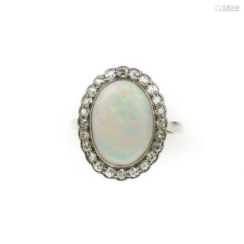 An opal and diamond cluster ring