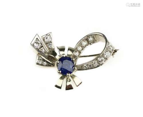 A sapphire and diamond bow brooch