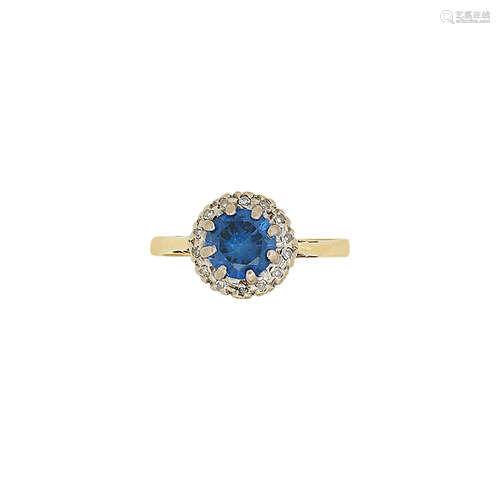 A sapphire and diamond cluster ring