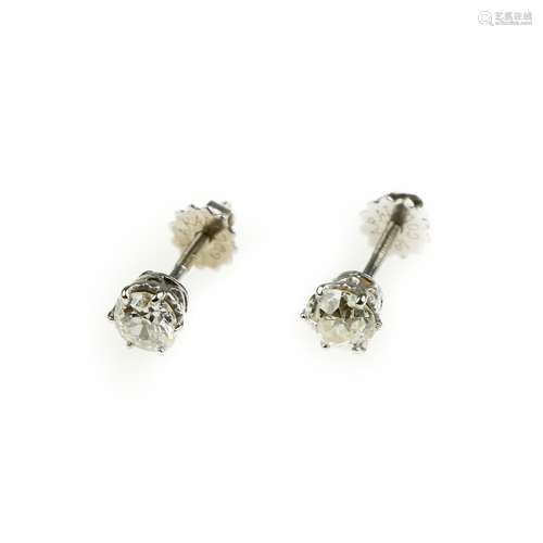 A pair of diamond ear studs