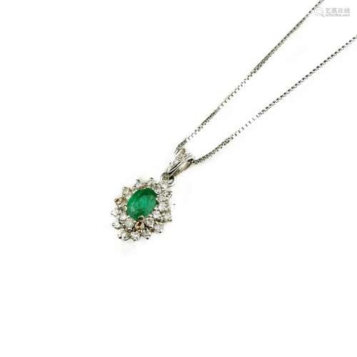 An emerald and diamond pendant and chain