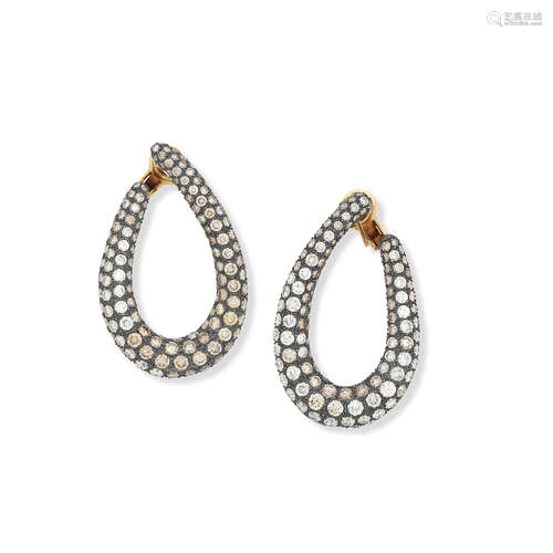 A pair of diamond hoop earrings