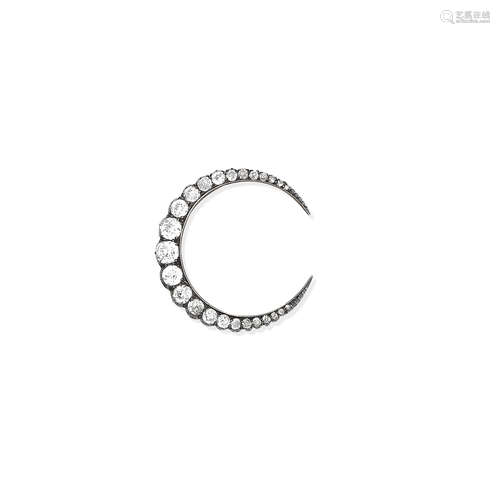 A diamond crescent brooch