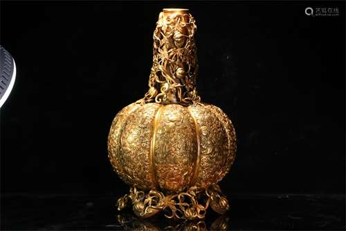 A Chinese Gilt Bronze Candle Holder