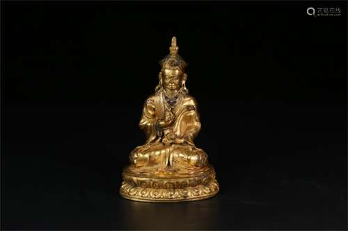 A Chinese Gilt Bronze Figure of Buddha