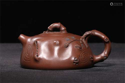 A Chinese Carved Yixing Clay Teapot