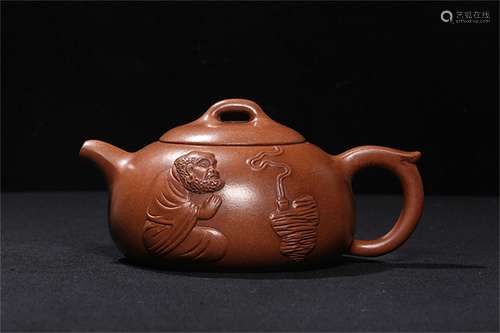 A Chinese Carved Yixing Clay Teapot