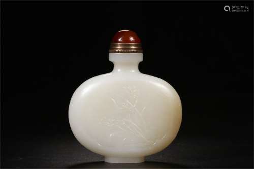 A Chinese Carved Jade Snuff Bottle