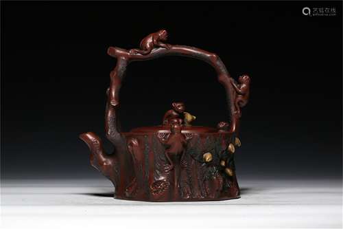 A Chinese Carved Yixing Clay Teapot