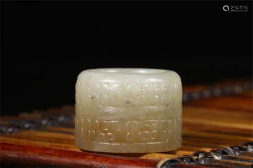 A Chinese Carved Jade Thumb Ring