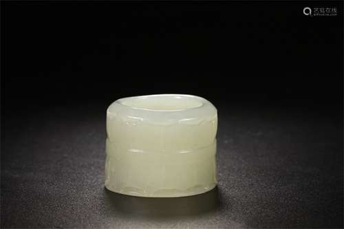 A Chinese Carved Jade Thumb Ring