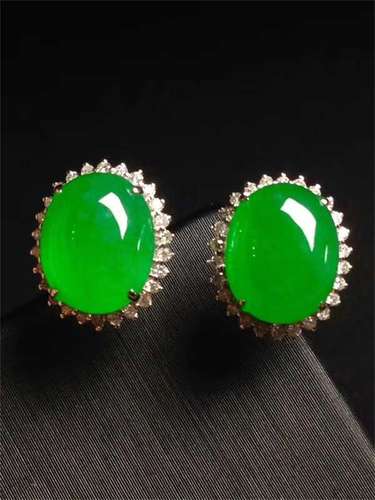 A Pair of Chinese Carved Jadeite Earrings