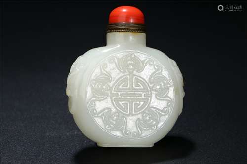 A Chinese Carved Jade Snuff Bottle