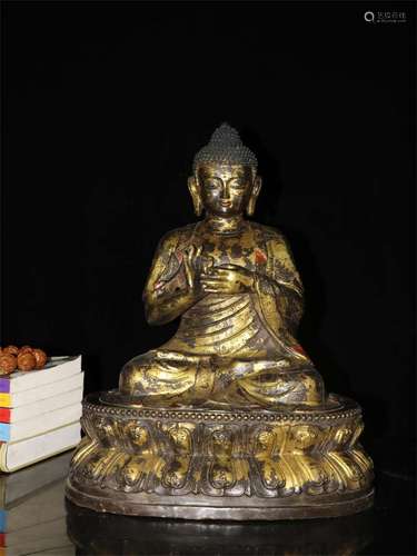 A Chinese Gilt Bronze Figure of Buddha