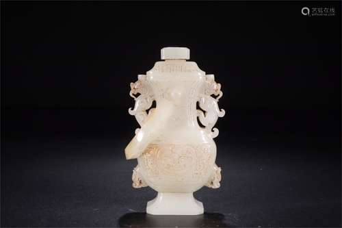 A Chinese Carved Jade Vase with Handle