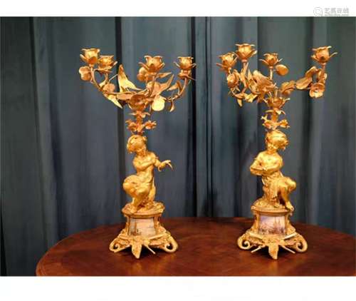 A Pair of French Gilt Bronze Candle Holders