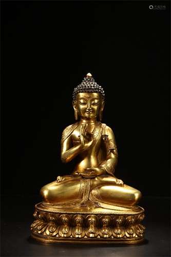 A Chinese Gilt Bronze Figure of Buddha