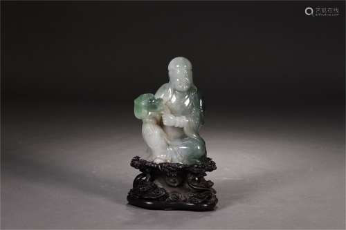 A Chinese Carved Jadeite Figure of Buddha