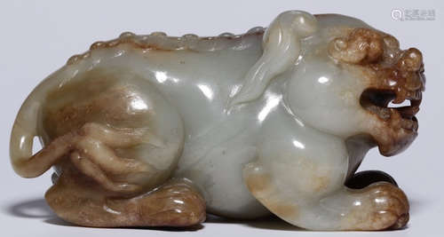 A HETIAN JADE CARVED LION SHAPED ORNAMNET