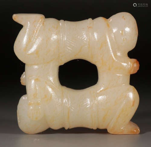 A HETIAN JADE CARVED KIDS SHAPED STATUE