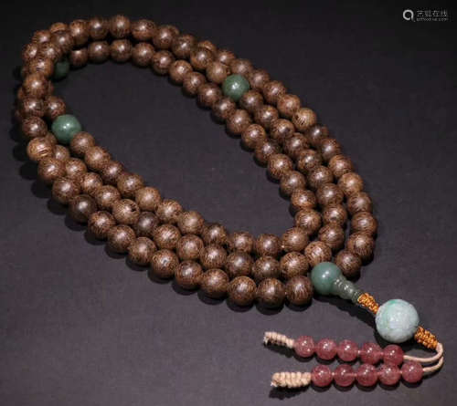 A CHENXIANG WOOD NECKLACE WITH 108 BEADS