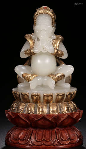 A HETIAN JADE BUDDHA STATUE OUTLINE IN GOLD