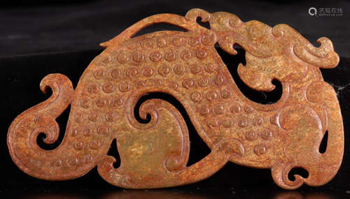 A HETIAN JADE CARVED DRAGON PATTERN PENDANT