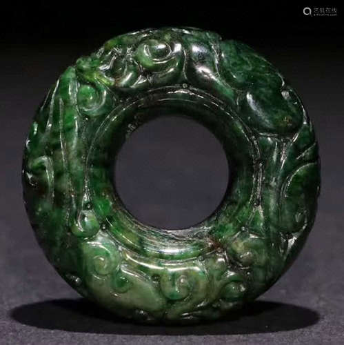 A JADEITE CARVED AUSPICIOUS PENDANT