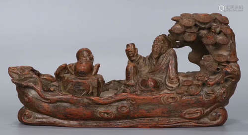 A CHENXIANG WOOD BOAT SHAPED PENDANT