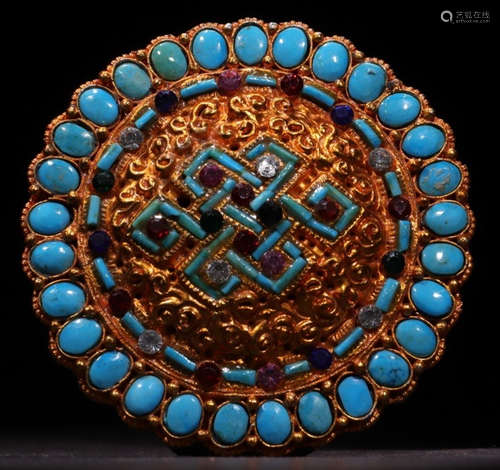 A TIBETAN GILT BRONZE WITH TURQUOISE PENDANT