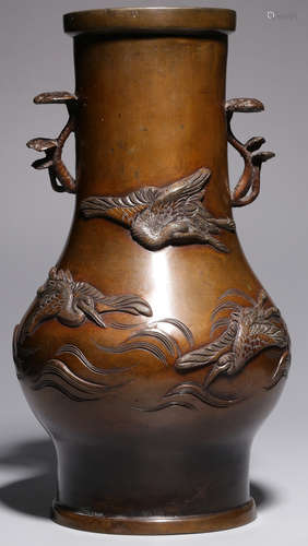 A COPPER CASTED VASE WITH CRANE PATTERN