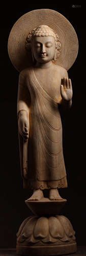 A WHITE MARBLE CARVED BUDDHA STATUE