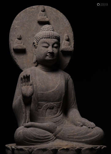 A BLUE STONE CARVED BUDDHA STATUE