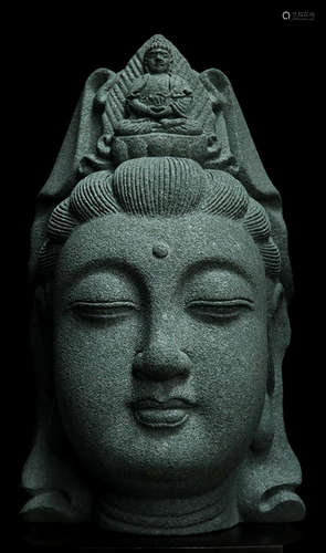 A BLUE STONE CARVED GUANYIN BUDDHA STATUE