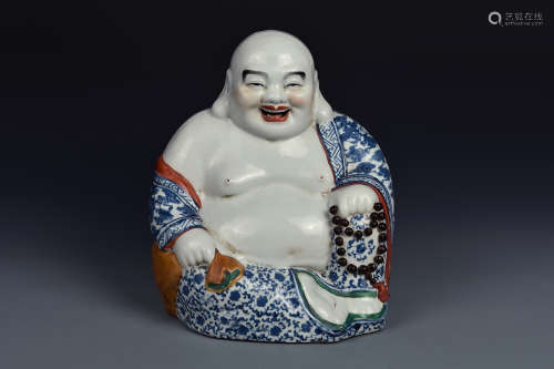 A BLUE AND WHITE BUDAI QING DYNASTY