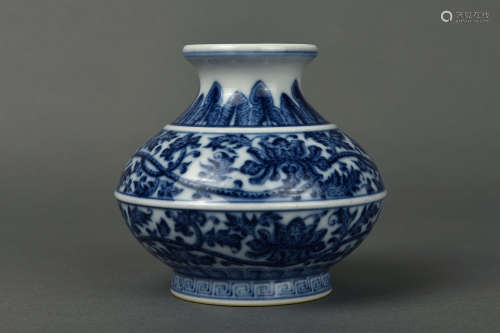 A BLUE AND WHITE LOTUS SCROLLS ZUN VASE QING DYNASTY