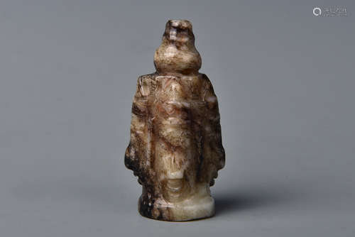 A WHITE AND RUSSET JADE AMULET YUAN DYNASTY