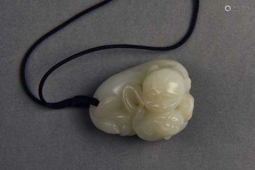 A CARVED JADE DOUBLE BADGERS