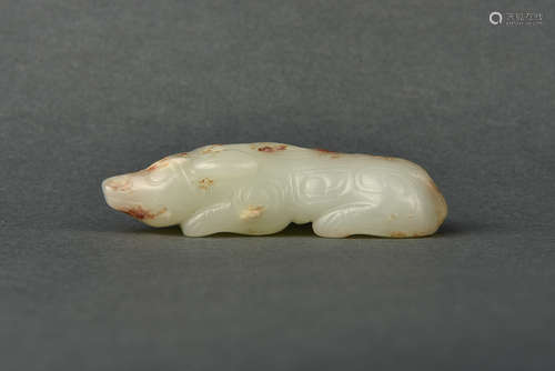 A WHITE AND RUSSET JADE BEAST MING DYNASTY