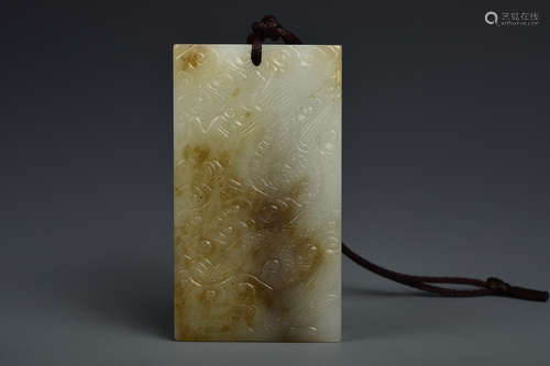 A WHITE AND RUSSET JADE PLAQUE QING DYNASTY