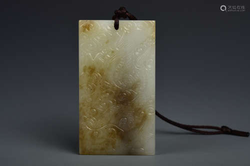 A WHITE AND RUSSET JADE PLAQUE QING DYNASTY
