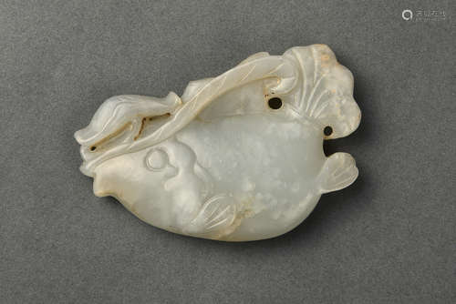 A CARVED WHITE JADE CARP