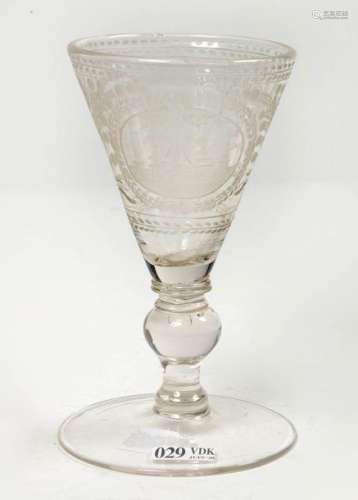 Translucent glass decorated with an engraved \