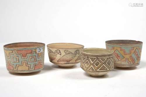 Set of four terracotta bowls with geometrical deco…