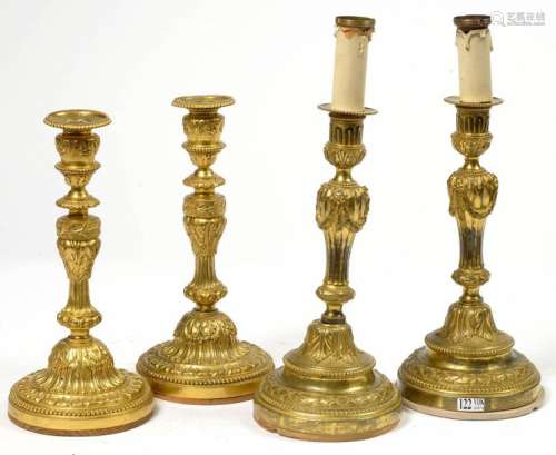 Two pairs of Louis XVI style brass candlesticks. P…