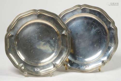 Two round dishes in silver: one with Dutch stamps …