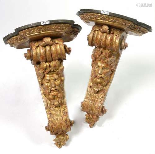 Pair of small wall consoles in carved and gilded w…